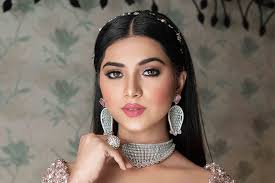 Fashion editorial-style image showcasing modern makeup and casual denim look